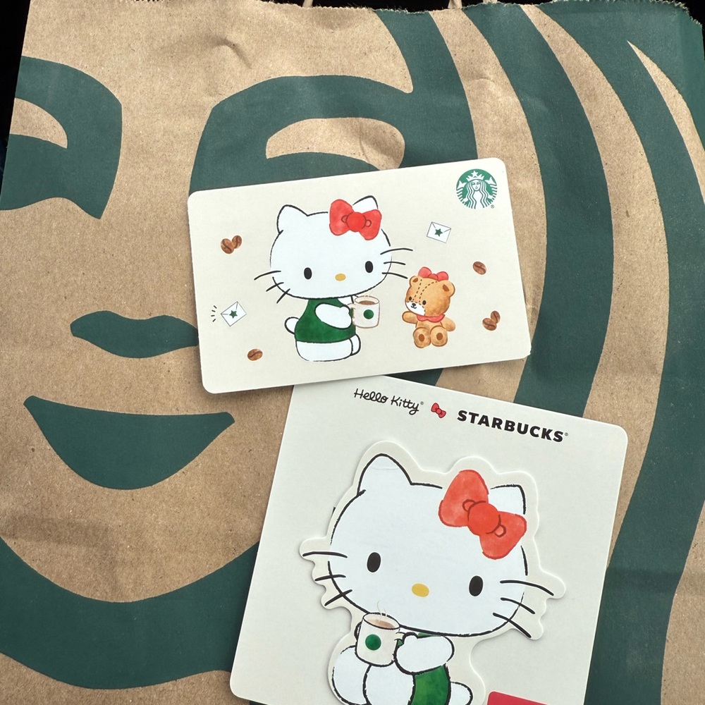 2 Hello Kitty Starbucks Gift Cards. You will get both that is pictured (: